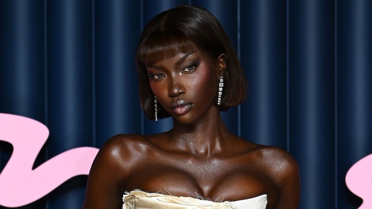 Anok Yai dares to wear shorts and a cropped jacket in the snow for Rhode Island.