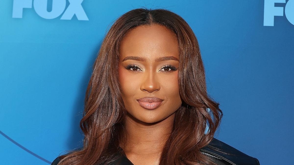 Travis Kelce's Ex Makes Waves in Daring skinBUTTR Latex Campaign