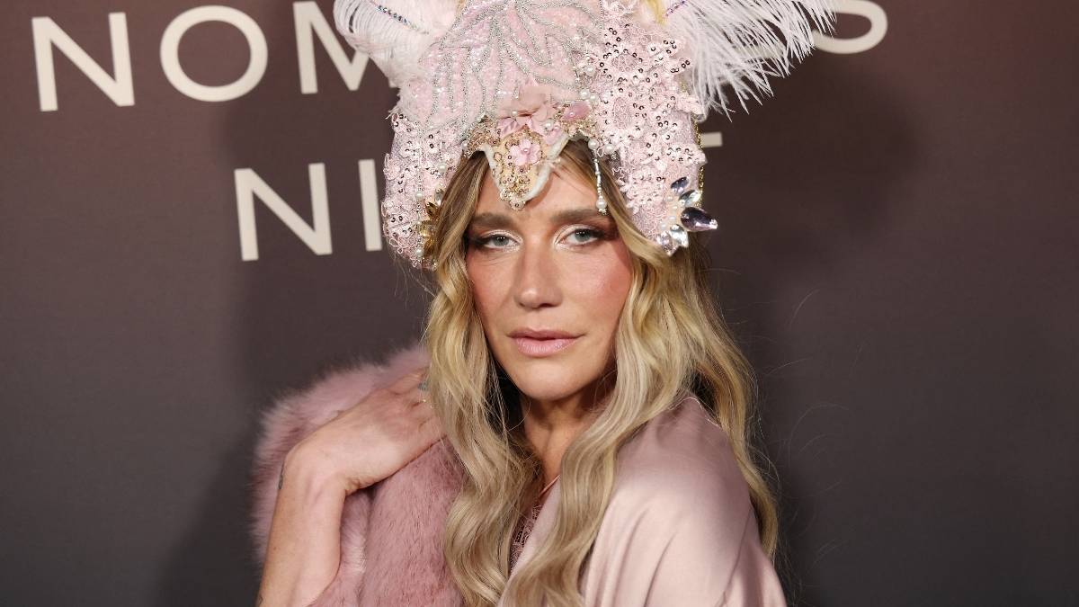 Kesha Stuns in Glamorous High-Slit Dress During Tour