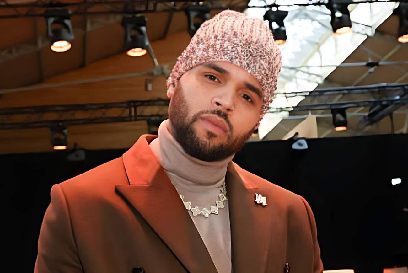 Songwriter files lawsuit against Chris Brown for unpaid royalties, alleging he penned lyrics for hit song 'Sensational'.