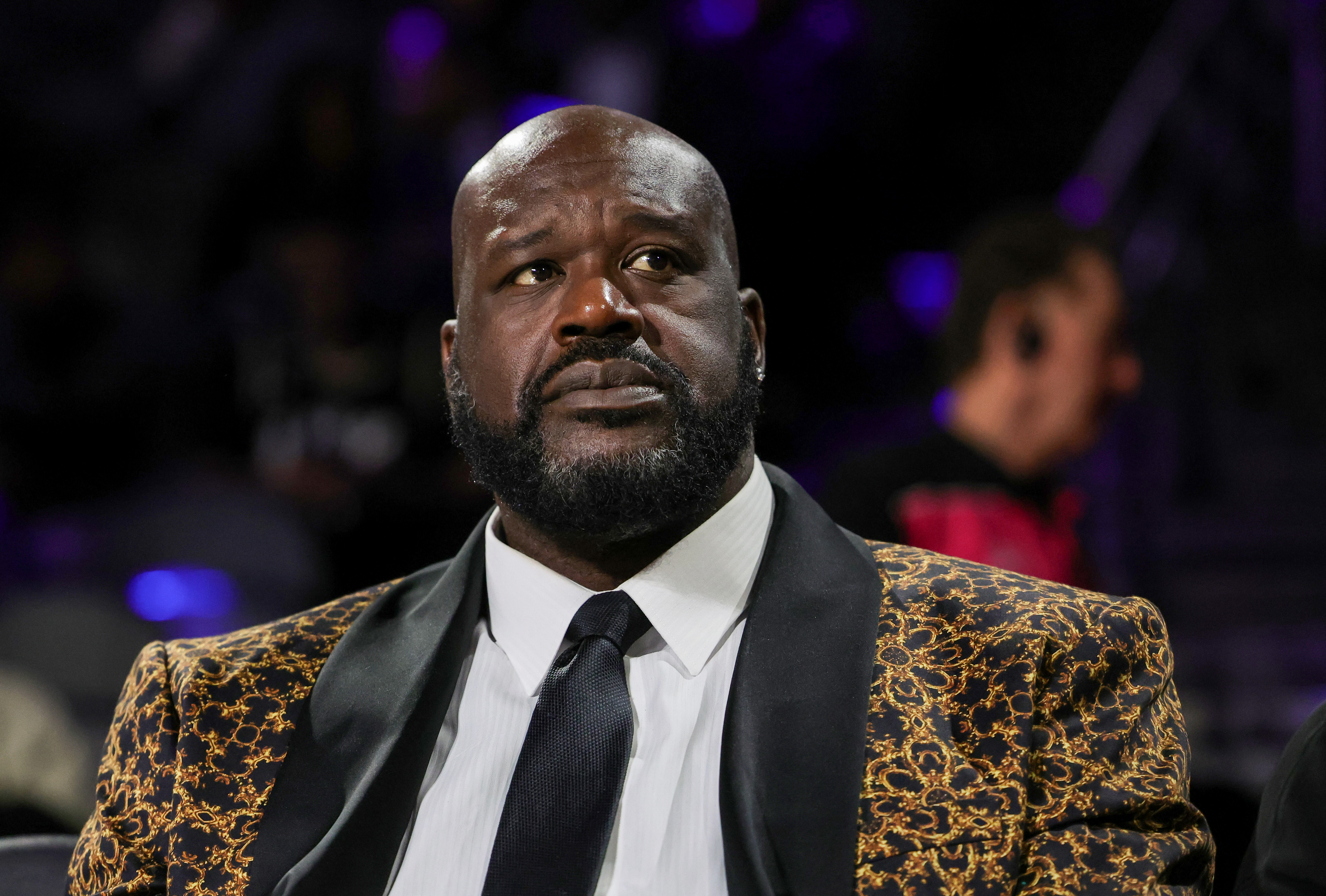 Shaq Responds to Viral Post Showing Him with Mystery Woman with Photos