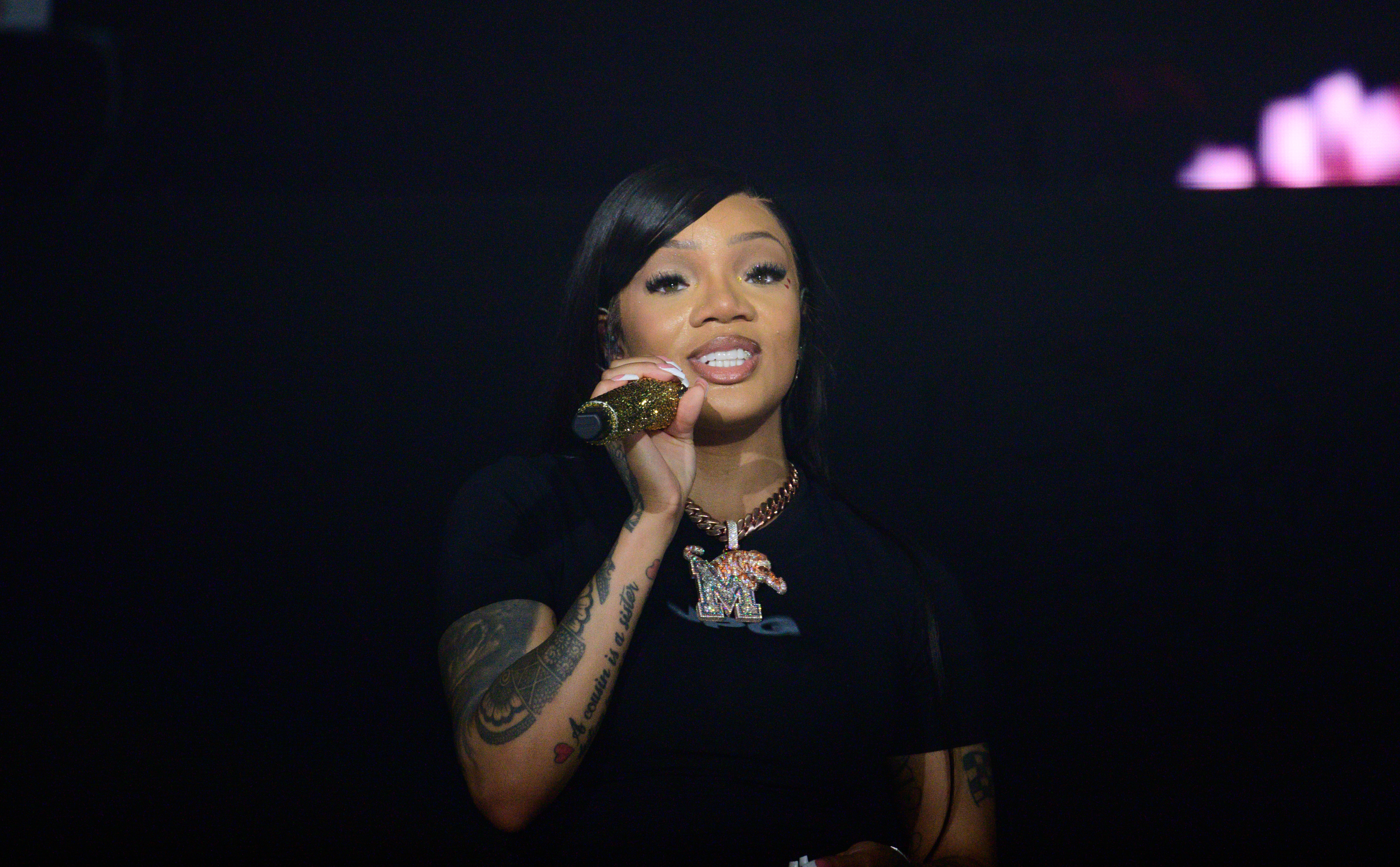 GloRilla's sister responds in interview, questions rapper's gift of a car to their dad in video.