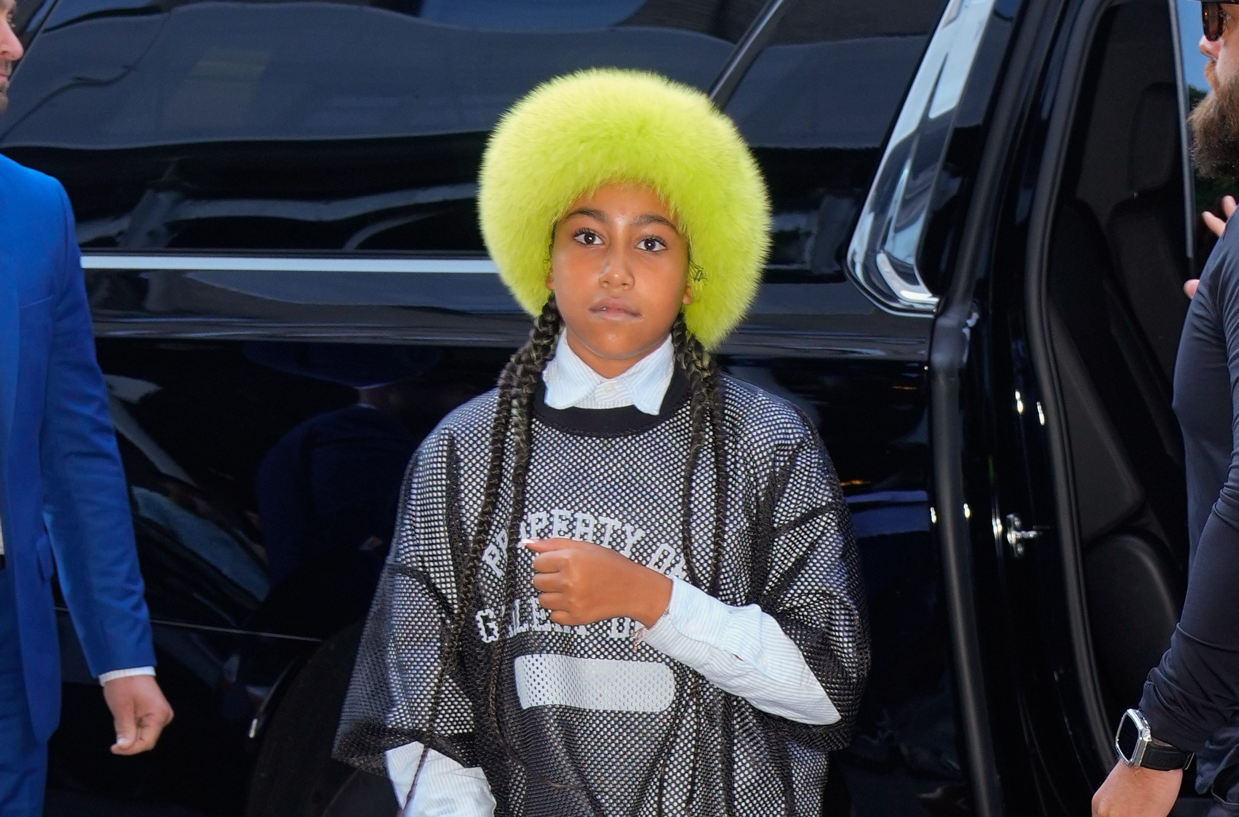 Social media users have mixed reactions as North West displays more visible hand piercings.