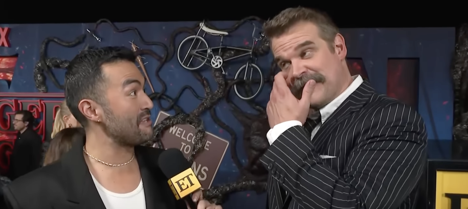 David Harbour and Millie Bobby Brown issue a statement at Stranger Things premiere in response to bullying accusations.