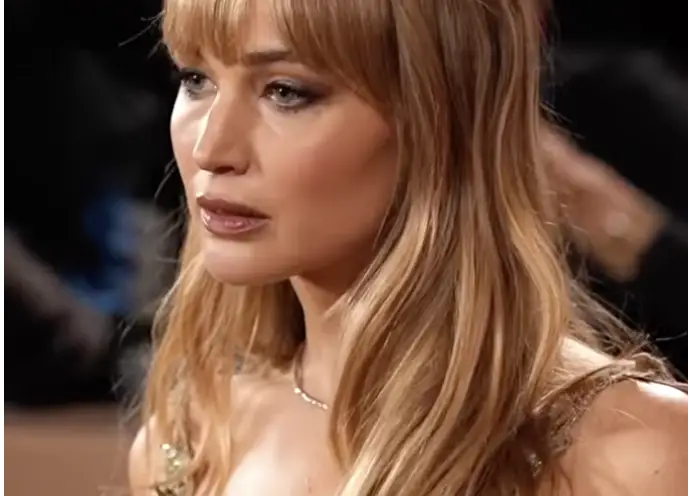 Jennifer Lawrence cracks a hilarious joke about showing up to the Golden Globes in a see-through dress.