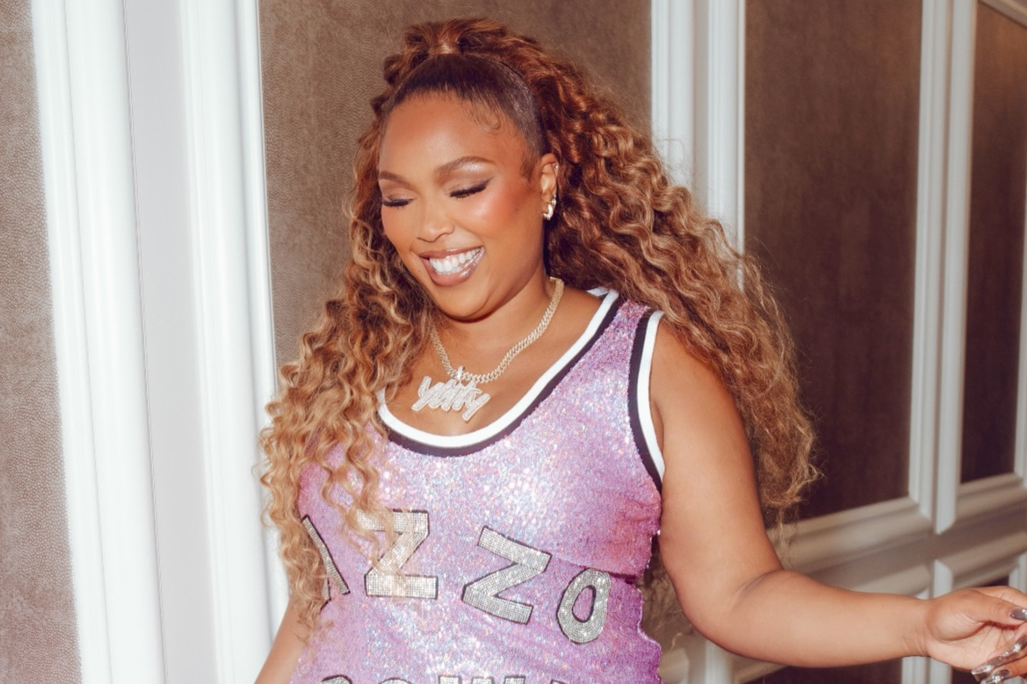 Lizzo's 60-Pound Transformation Dazzles in Sparkly Pink Dress