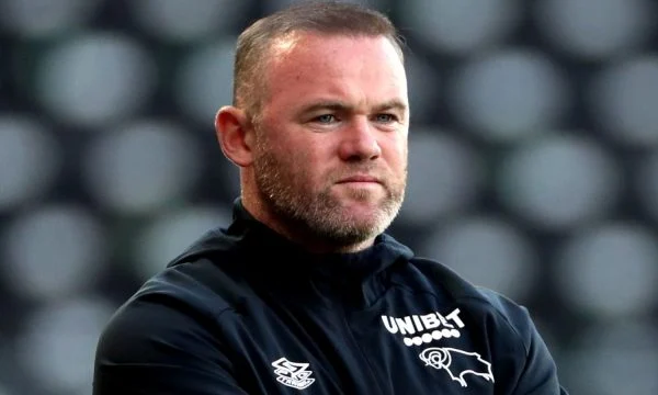 Rooney: Messi's World Cup Win Could End the Ronaldo Debate